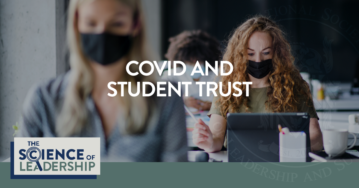 How COVID Impacted Student Trust | The Science of Leadership | Two students wearing masks work on their laptops in a classroom