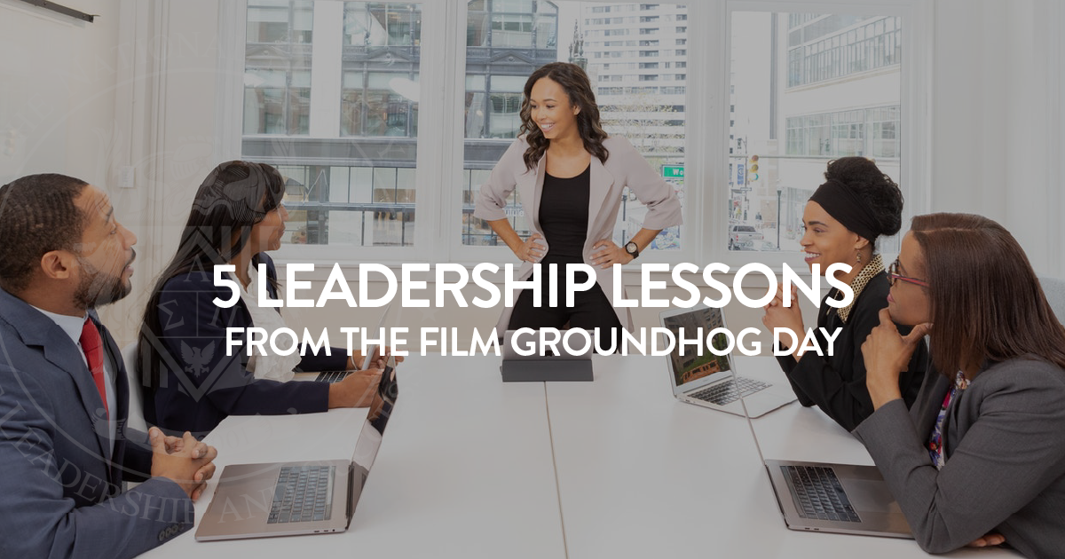 woman leading a team meeting in office building